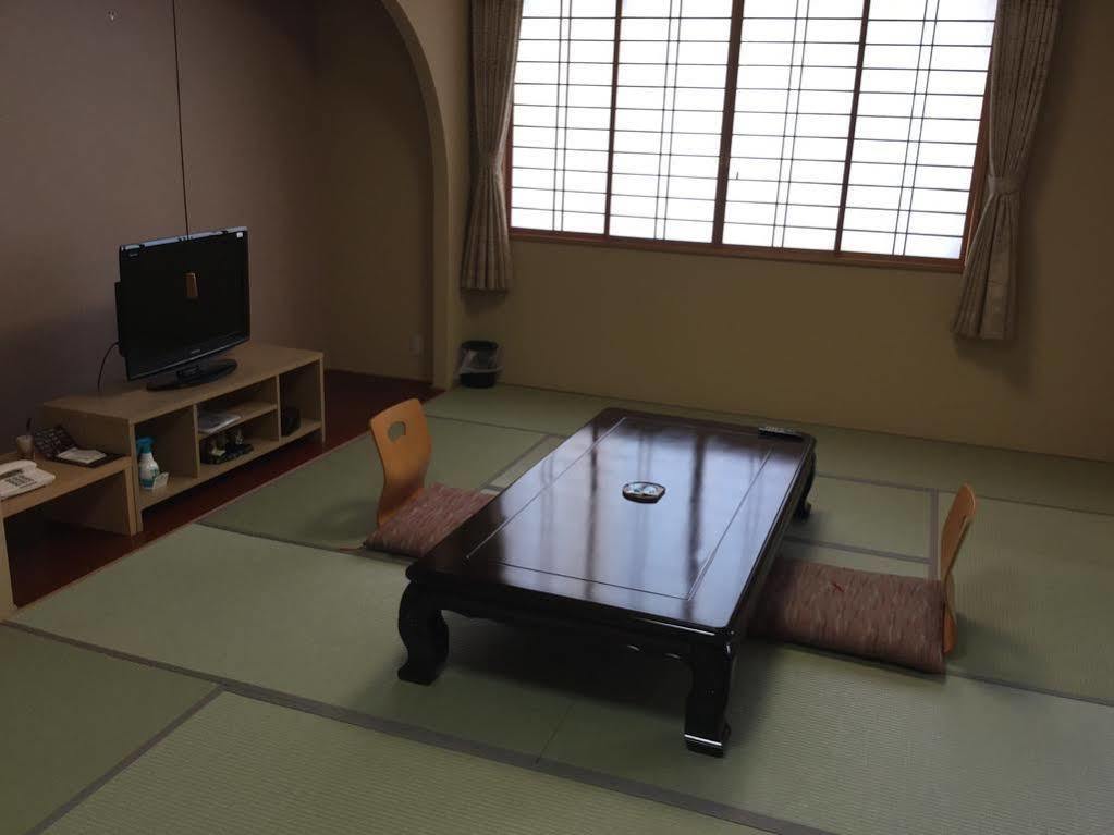 Отель Yunokaku Ikedaya Teshikaga Экстерьер фото