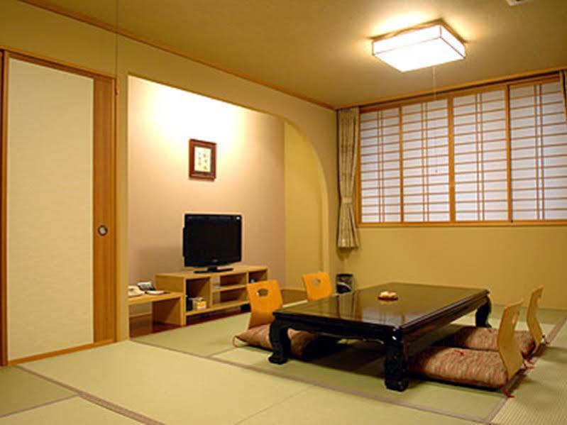 Отель Yunokaku Ikedaya Teshikaga Экстерьер фото